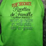 Tablier de cuisine vert apple "Top secret recettes de famille"